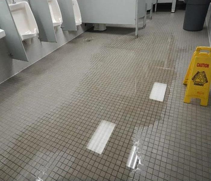 water  on bathroom floor
